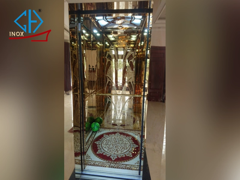 Cabin inox thang máy vàng hoa văn rẻ quạt