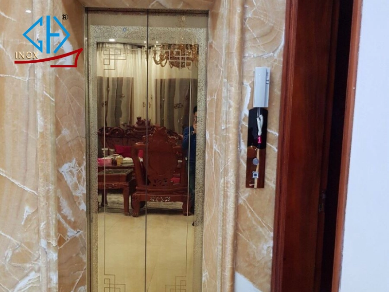 Cabin inox thang máy vàng hoa văn chữ nhật